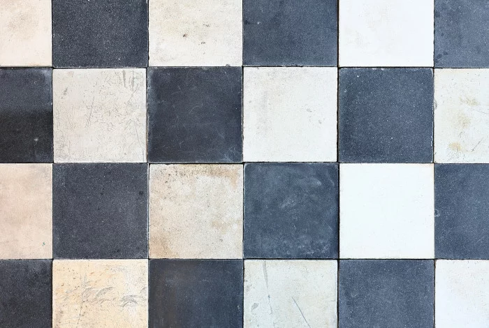 oude geblokte cementtegels